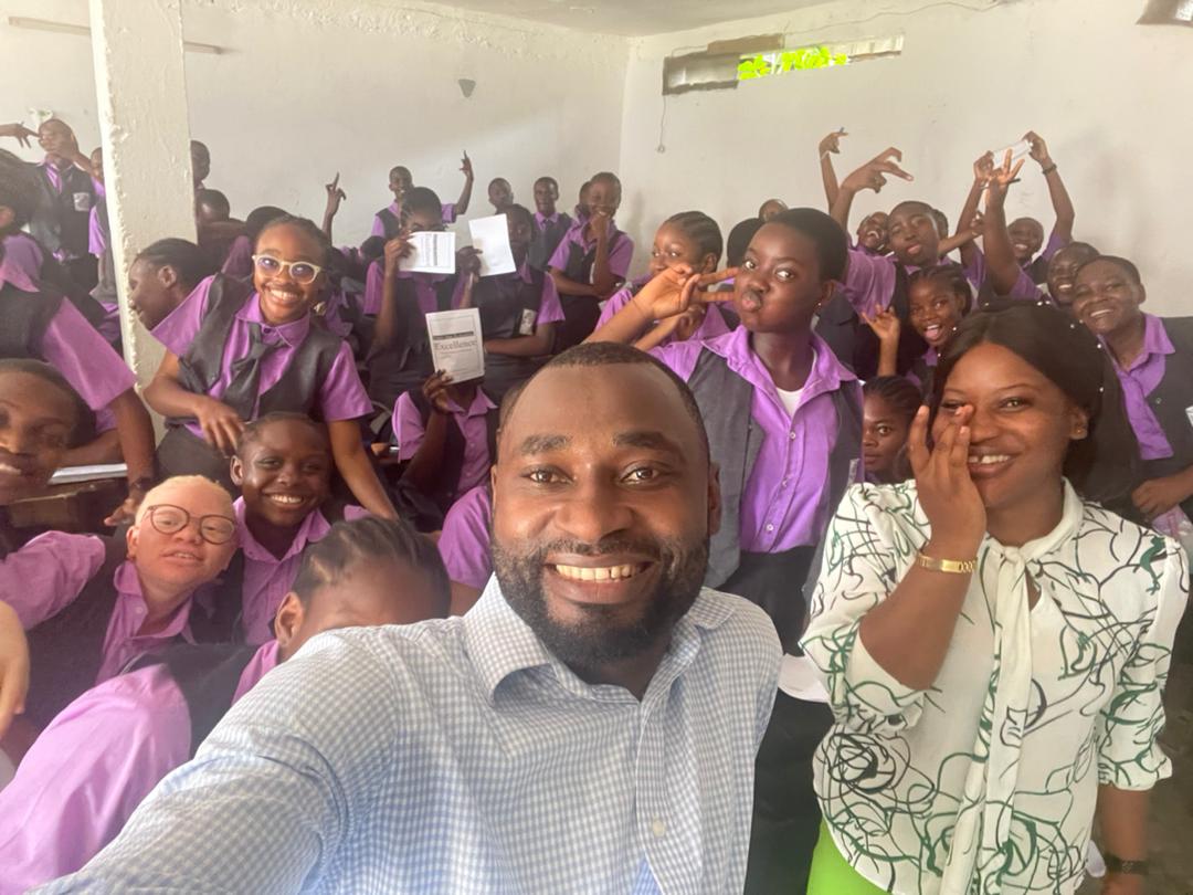 YECAM team engaging students during an outreach session
